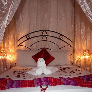 Suite met een Queen Size Bed